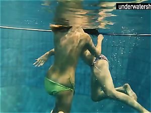 two splendid amateurs showcasing their bods off under water